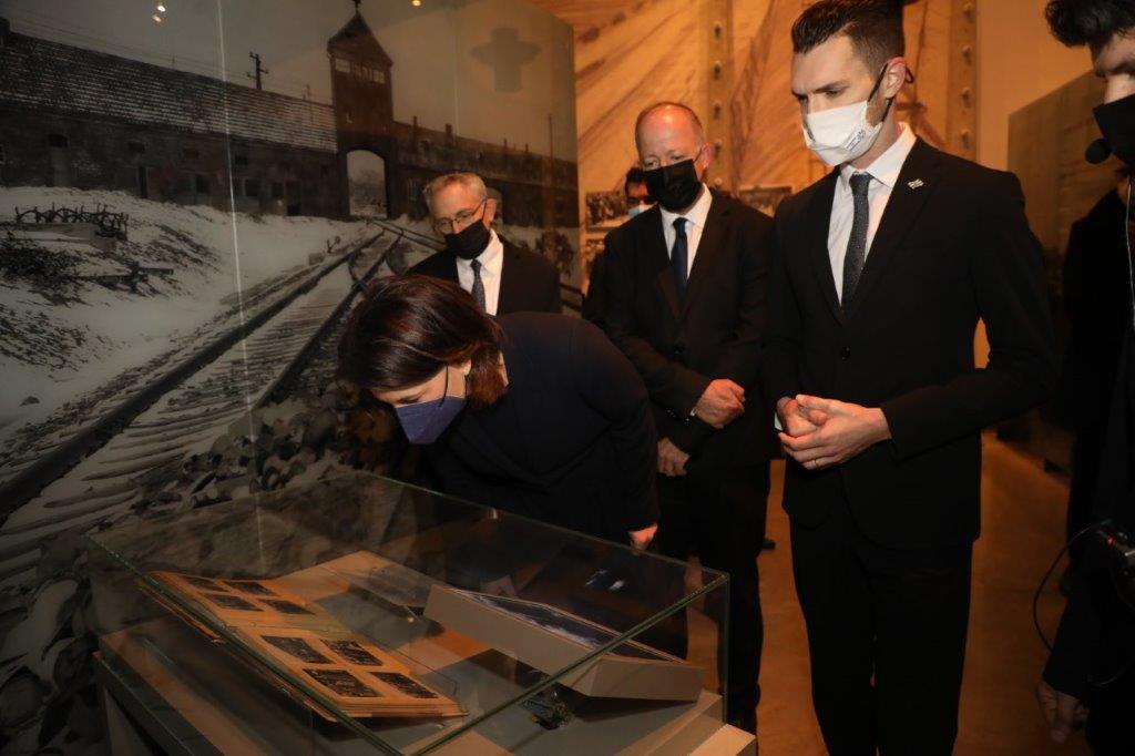 The German Foreign Minister views the Auschwitz Album on display in the Holocaust History Museum at Yad Vashem